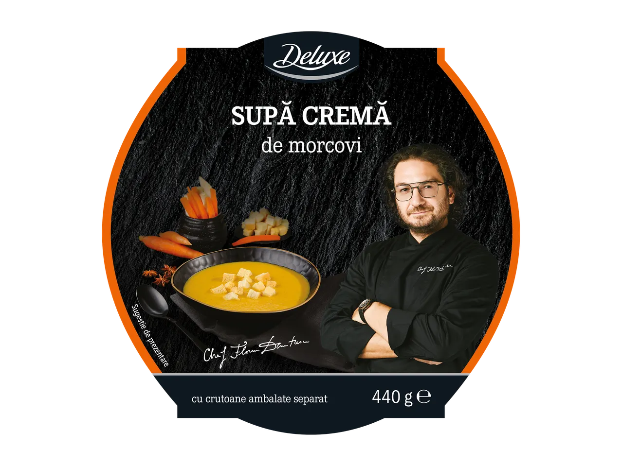 Ambalaj supă cremă de morcovi Deluxe, cu crutoane și imaginea unui chef.