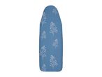 A blue ironing board cover with a leaf pattern.