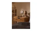 Night light with USB charger plugged into a wall socket, charging a phone on a bedside table.