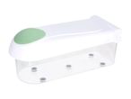 White and green kitchen gadget with a clear container, possibly a garlic press or chopper.