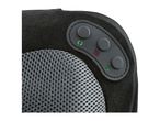 Close-up of a black massage cushion with control panel and mesh fabric.