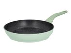 Light green frying pan with a speckled black non-stick interior.
