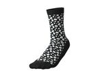 Black sock with white polka dots
