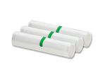 Three rolls of white vacuum sealer bags with green bands.