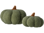 Two green, textured decorative pumpkin cushions with brown stems.