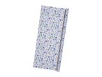 A roll of floral-patterned wrapping paper with purple and orange flowers on a light blue background.