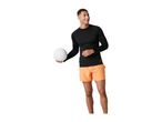 Man in black long-sleeve swim shirt and orange swim shorts holding a volleyball.