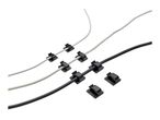 Black adhesive cable clips securing white, silver, and black cables.