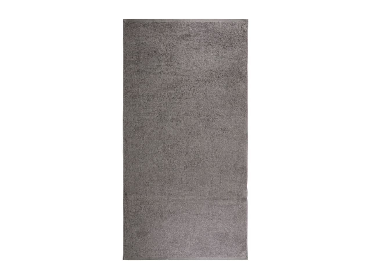 A long, rectangular grey bath towel with a textured surface.