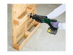 Reciprocating saw cutting a wooden pallet