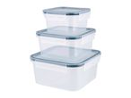 A set of three stackable square plastic food storage containers with gray lids.