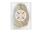 Braided cheese in clear packaging with a colorful, folk-art inspired label.