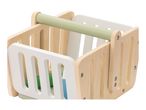 Wooden toy shopping basket with a light green handle and white slatted sides.