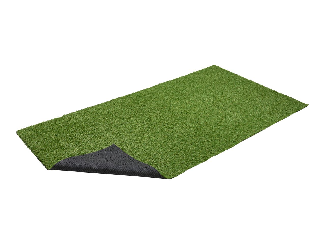 Artificial grass mat with a corner lifted to show the black backing