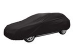 Black car cover protecting a vehicle