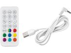A white remote control with color buttons and a USB power cable.