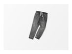 A pair of gray denim jogger pants with a white drawstring on a white background.