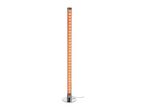 A tall, cylindrical floor lamp with a chrome base and an illuminated, sparkling orange interior.