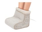 Heated foot warmer in a light color with feet inserted, on a white background.