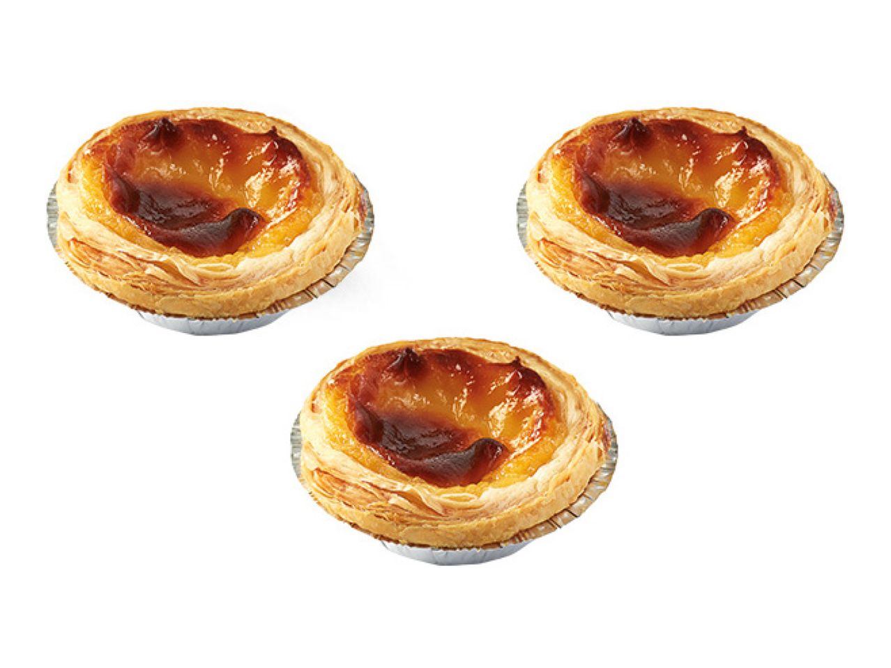 Three Portuguese custard tarts (Pastéis de Nata) with flaky crusts and caramelized tops.