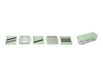 Assortment of five small, light green rectangular components and a larger, pale green rectangular enclosure.