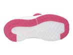 Bottom view of a pink and white children's shoe sole with a textured grip pattern.