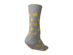 Grey sock with a pattern of yellow rubber ducks wearing Santa hats