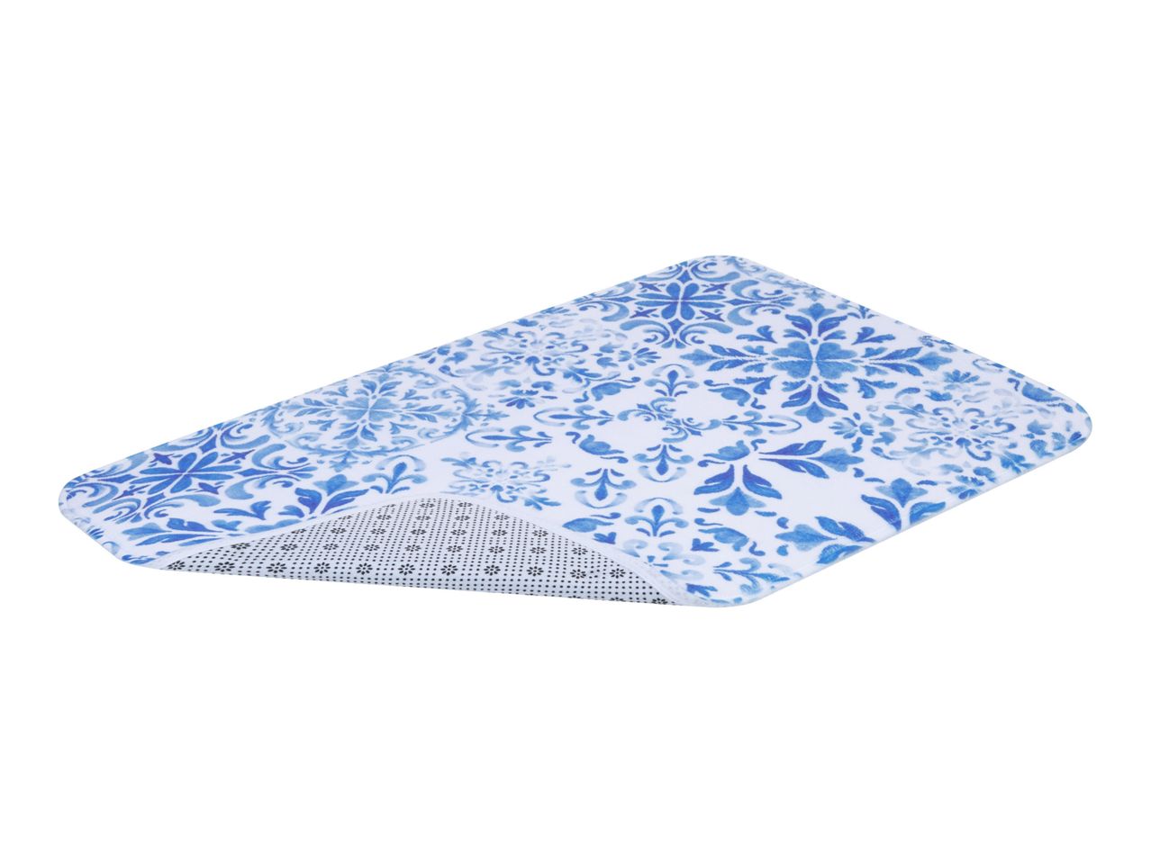 A blue and white patterned wedge pillow.