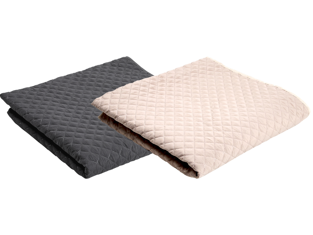 Två vikta, quiltade filtar i grått och beige.