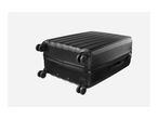 Black hard-shell suitcase with four double spinner wheels, lying on its side.