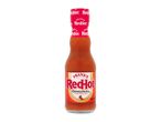 A bottle of original cayenne pepper sauce with a red label.