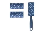 Blue lint roller with two replacement rolls, decorated with white polka dots.