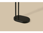 Base oval preta e duas hastes verticais de um toalheiro ou suporte de escova de sanita LIVARNO.