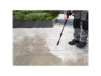 Parkside pressure washer cleaning patio tiles.