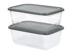 Two rectangular clear food storage containers with dark grey lids, stacked on top of each other.