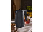 SILVERCREST® 3000W Kettle in black, steaming on a kitchen counter with drinks.