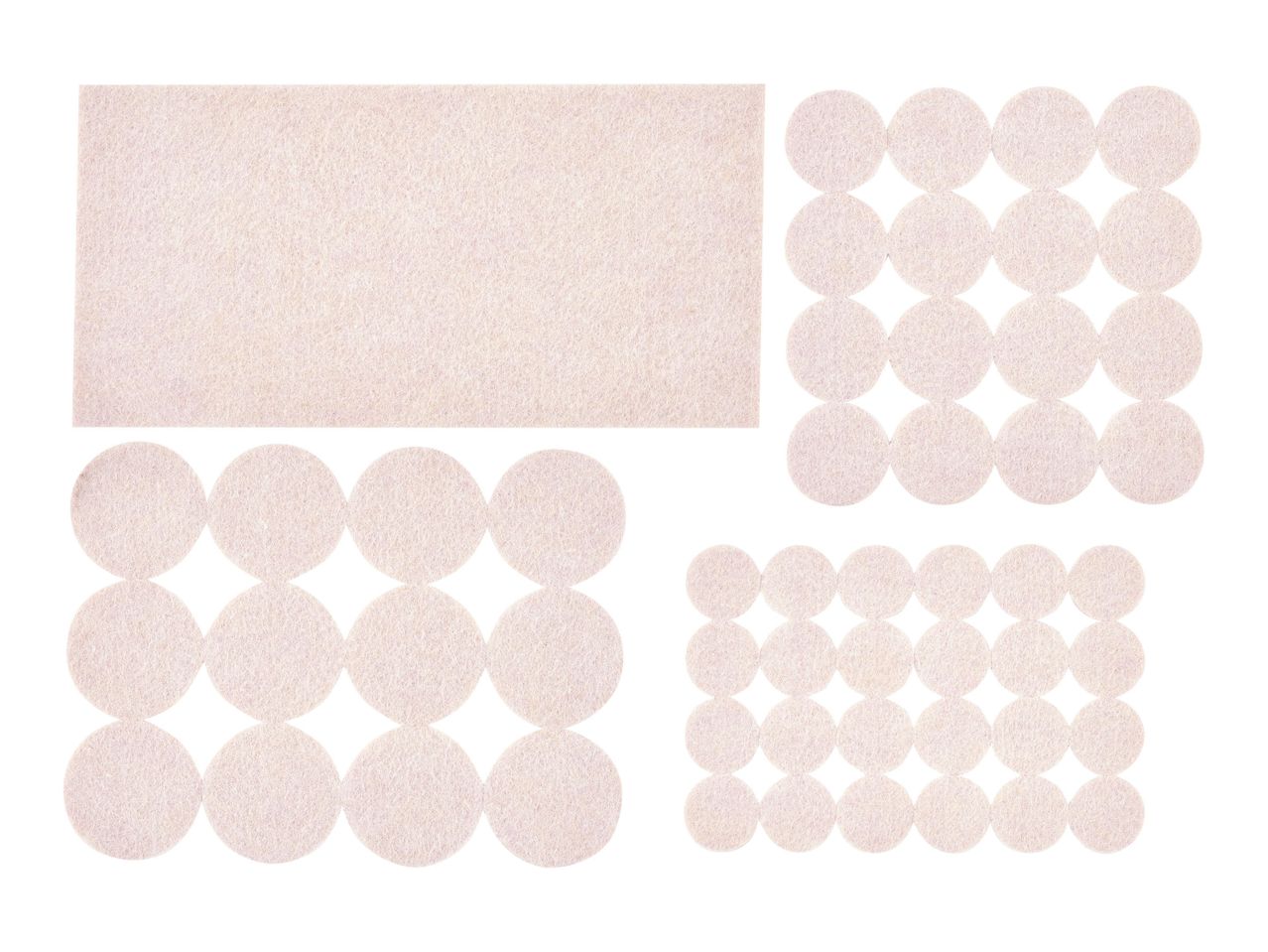 A set of three blush-pink bath mats with a unique circular pattern.