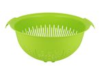 A bright green plastic colander with handles.