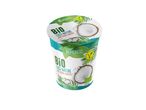 Un pot de yaourt VEMENDO Bio Coco Nature sans sucres ajoutés, avec des noix de coco.