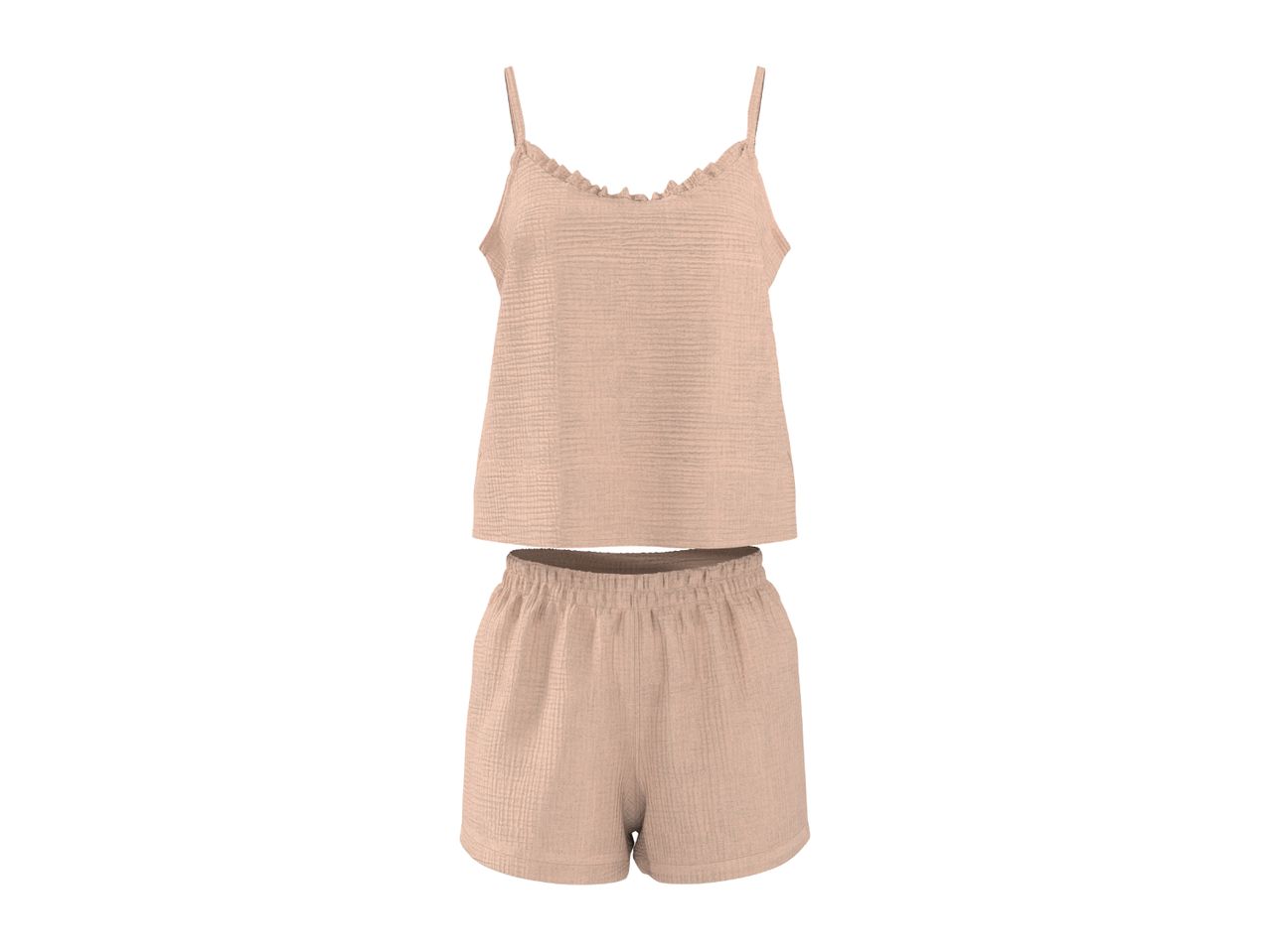 Light pink textured pajama set with a ruffled camisole top and elasticated shorts.