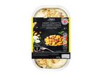 Macaroni cheese with crispy pancetta and croutons in a ready meal tray.
