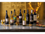 A selection of fine wines from various regions, including South African Sauvignon Blanc and Shiraz, Argentinian Malbec, and Spanish Rioja.