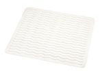 White square bath mat with wavy texture and drainage holes