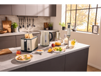 SILVERCREST® kitchen appliances including a mini chopper, toaster, kettle, and hand blender.