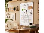 Home office with whiteboard calendar, desk lamp, and plants, featuring a 'To Do' list.