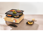 SILVERCREST® Bambusa raclette grill liha, krevettide ja köögiviljadega laual.