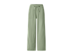 Ženske široke hlače iz muslina v svetlo zeleni barvi z vrvico v pasu.
