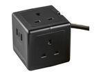 Black cube-shaped power strip with multiple outlets and USB ports, including Type A and Type C.