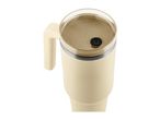 Cream-colored travel mug with a handle and a clear lid, viewed from above.