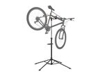 Bicycle repair stand with a mountain bike mounted on it, against a white background.